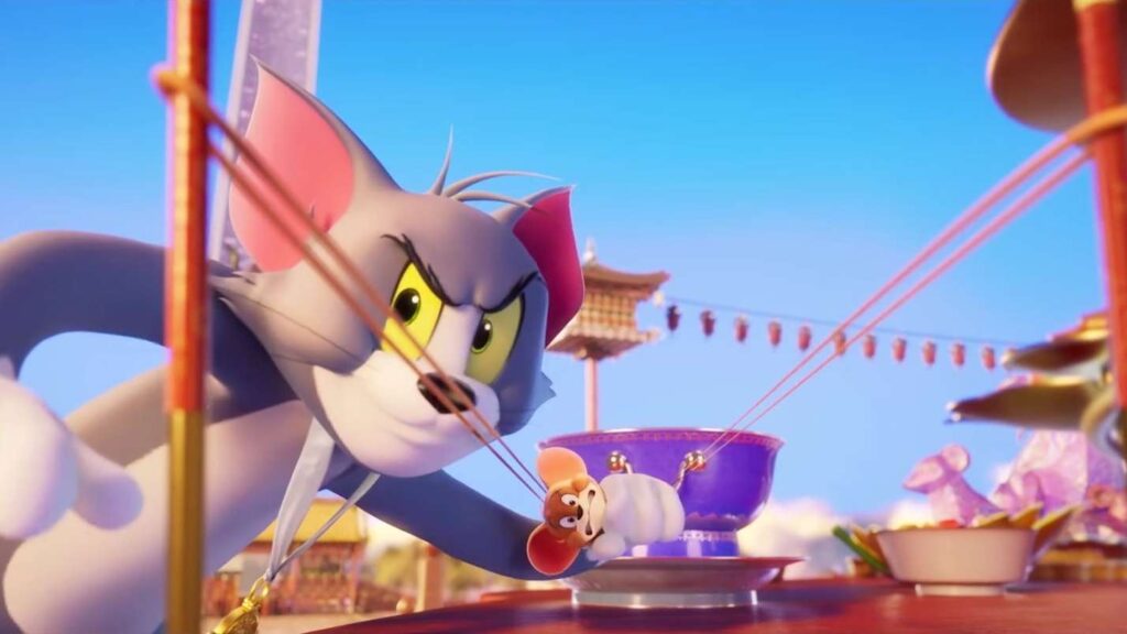 Tom i Jerry, otoczeni lampionami i tradycyjnymi dekoracjami.